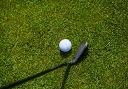 Golf Ball and Iron golfer view