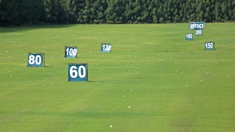 Yard signs in driving range golf course