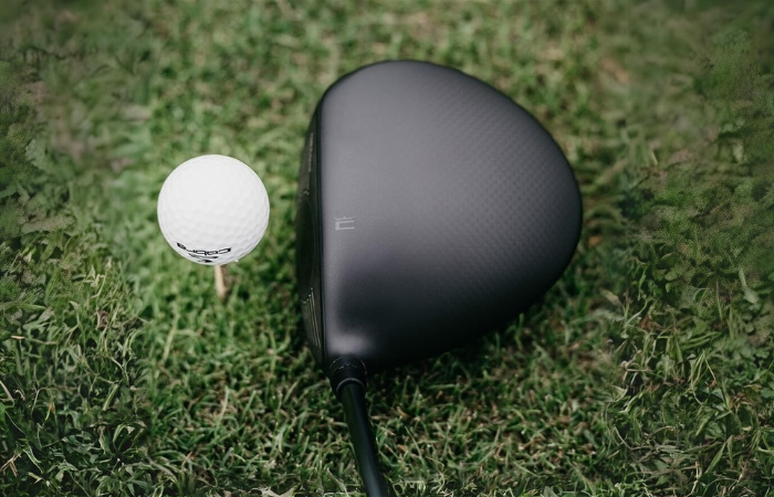 cobra darkspeed driver and golf ball on grass
